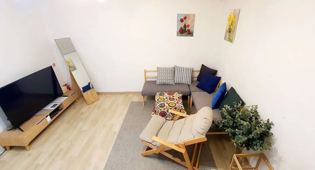 The first room - Queen Bed, Sofa, TV