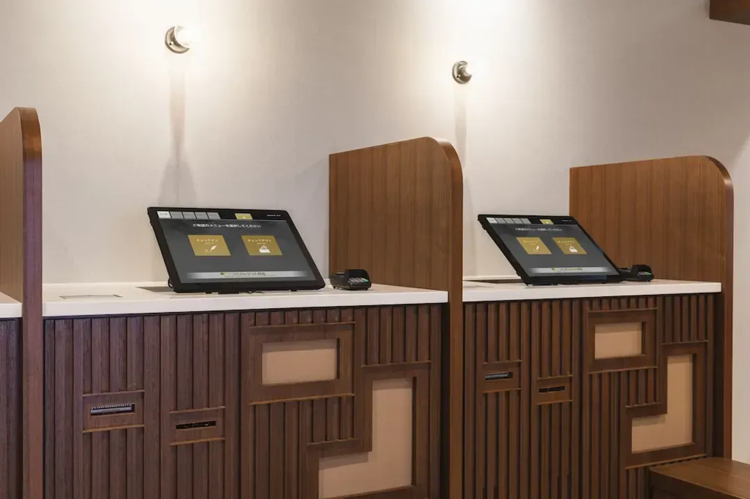 Check-in/check-out kiosk