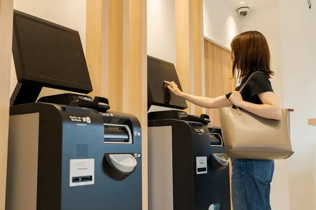 Check-in/check-out kiosk