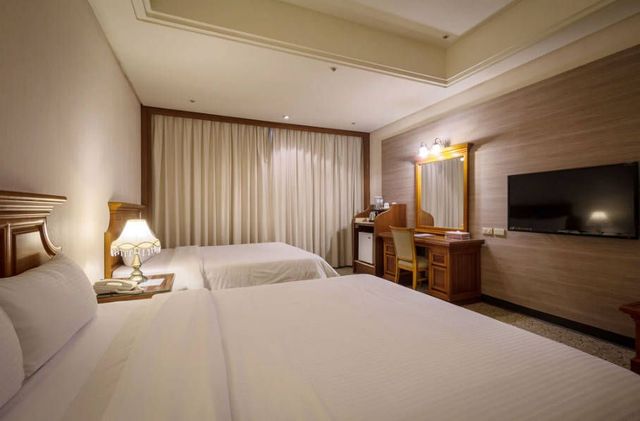 Guide Hotel Zhongli Zhongzheng-Deluxe Quadruple Room-3