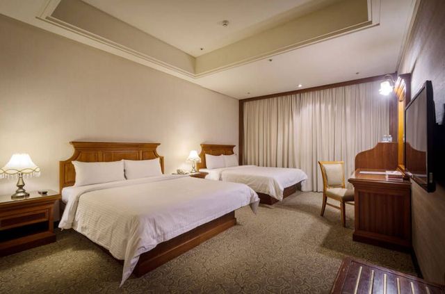 Guide Hotel Zhongli Zhongzheng-Deluxe Quadruple Room-1