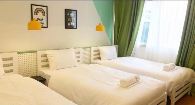 The Ellis Bangkok-Bed in Economy Triple Room with Shared Bathroom-1