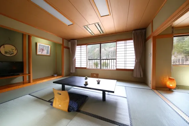 West Building Japanese-style room 12.5 + 4.5 Tatamiyama side [View: Urayama]