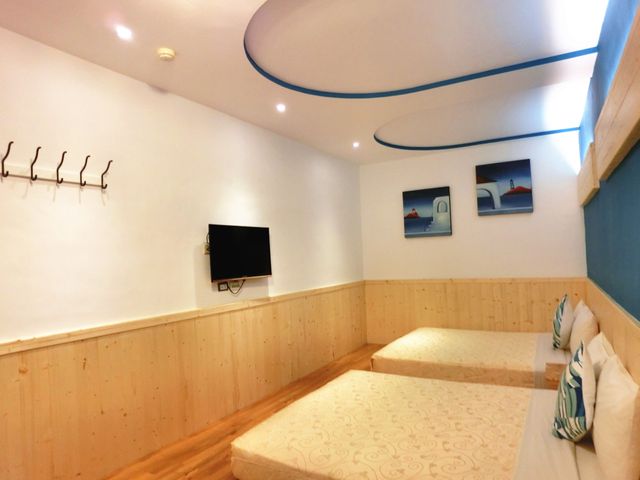 興吉旅店 | 室內公共空間自行車停放-本舘四人房-9