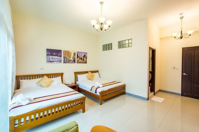 墾丁沐晨旅店｜可12人包棟｜65吋智慧聯網電視、歡唱設備、電動麻將、烤肉、switch遊戲機-家庭四人房-4