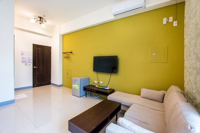 墾丁沐晨旅店｜可12人包棟｜65吋智慧聯網電視、歡唱設備、電動麻將、烤肉、switch遊戲機-家庭四人房-7