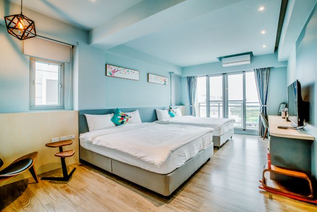 오션 파티 페밀리 펀 홈스테이 (Ocean Party Family Fun Homestay)-Sea View Quad Room With Balcony-Nordic-4