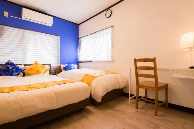 Golden bed room : 1 Double size bed (& Shingle sized Tatami bed for extra bed)