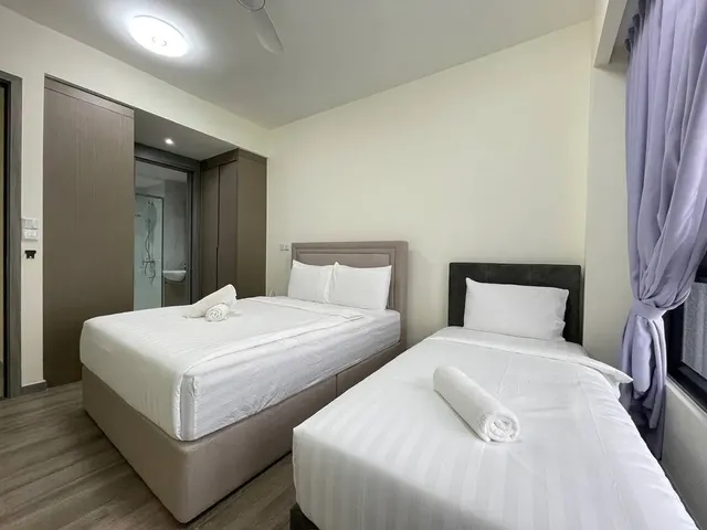 queen and single bed bedroom