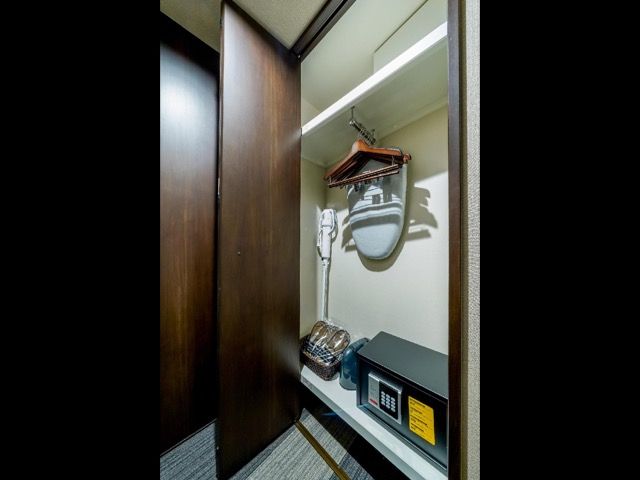 The hangers are in the closet in front of the kitchen. You can hang your jacket and the clothing . Also you can put the small luggage inside.