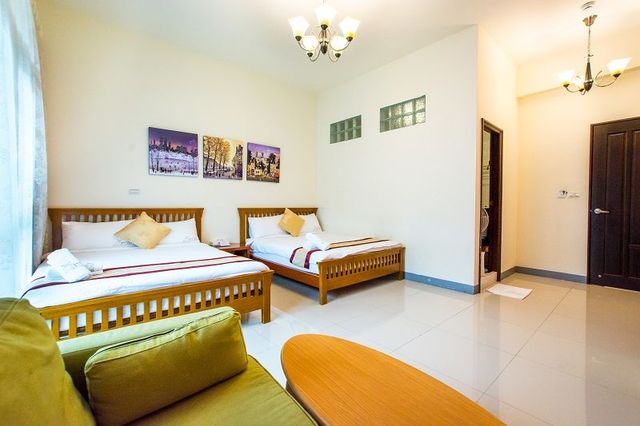 墾丁沐晨旅店｜可12人包棟｜65吋智慧聯網電視、歡唱設備、電動麻將、烤肉、switch遊戲機-包棟12人(四人房*2+雙人房*2)，電動麻將、歡唱設備、switch遊戲機、烤肉設備、大客廳、廚房、停車位-4