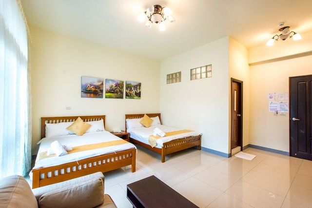 墾丁沐晨旅店｜可12人包棟｜65吋智慧聯網電視、歡唱設備、電動麻將、烤肉、switch遊戲機-包棟12人(四人房*2+雙人房*2)，電動麻將、歡唱設備、switch遊戲機、烤肉設備、大客廳、廚房、停車位-6