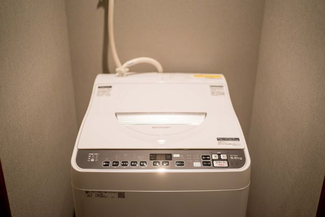 You can use private washing machine in your room.