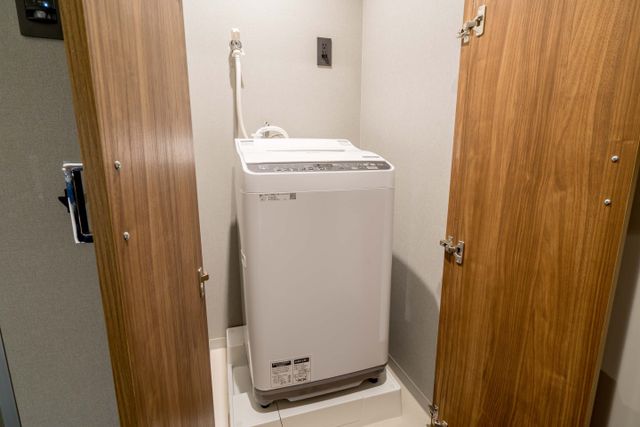 You can use private washing machine in your room.