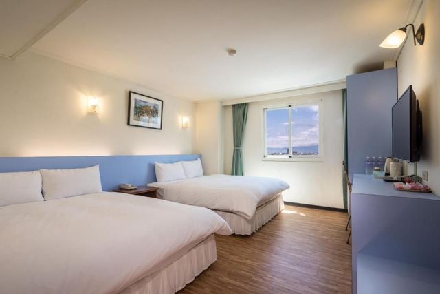 Apple Hotel-Comfortable Quadruple Room-4